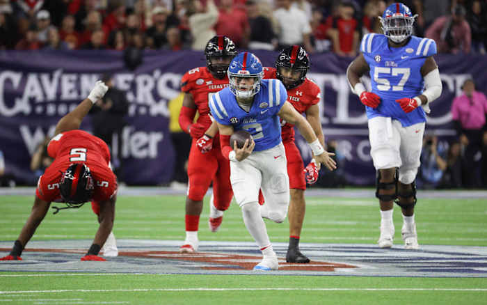 Dec 28, 2022; Houston, Texas, USA; Mississippi Rebels quarterback Jaxson Dart (2) runs with the ball during the fourth quarter against the Texas Tech Red Raiders in the 2022 Texas Bowl at NRG Stadium.
